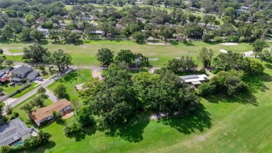 Experience serene, resort-style living in this stunning estate on Babe Zaharias Golf Course in Florida - for sale on GolfHomes.com, golf home, golf lot