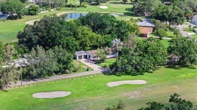 Experience serene, resort-style living in this stunning estate on Babe Zaharias Golf Course in Florida - for sale on GolfHomes.com, golf home, golf lot