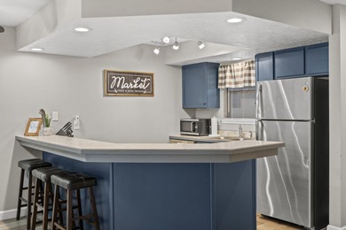 This bright and fully updated 2-bedroom, 2-bath condo offers on Pointe Royale Village Country Club in Missouri - for sale on GolfHomes.com, golf home, golf lot