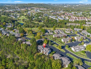 This bright and fully updated 2-bedroom, 2-bath condo offers on Pointe Royale Village Country Club in Missouri - for sale on GolfHomes.com, golf home, golf lot