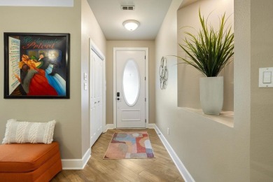 Stunning, well-maintained townhome nestled on the 14th fairway on  in Florida - for sale on GolfHomes.com, golf home, golf lot