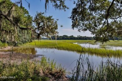 Stunning waterfront location and exquisite features, this home on Oldfield Golf Club in South Carolina - for sale on GolfHomes.com, golf home, golf lot