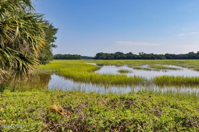 Stunning waterfront location and exquisite features, this home on Oldfield Golf Club in South Carolina - for sale on GolfHomes.com, golf home, golf lot