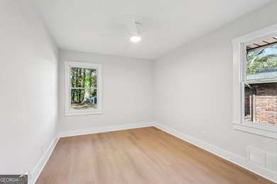 Luxury living on a budget! Picture a home that minds its on Browns Mill Golf Course in Georgia - for sale on GolfHomes.com, golf home, golf lot