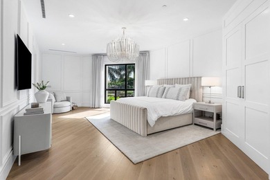 Beyond the private gates of Boca Grove Country Club, a residence on Boca Grove Golf and Tennis in Florida - for sale on GolfHomes.com, golf home, golf lot