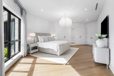 Beyond the private gates of Boca Grove Country Club, a residence on Boca Grove Golf and Tennis in Florida - for sale on GolfHomes.com, golf home, golf lot