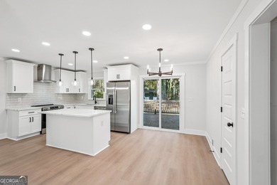 Luxury living on a budget! Picture a home that minds its on Browns Mill Golf Course in Georgia - for sale on GolfHomes.com, golf home, golf lot