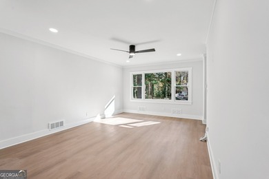 Luxury living on a budget! Picture a home that minds its on Browns Mill Golf Course in Georgia - for sale on GolfHomes.com, golf home, golf lot