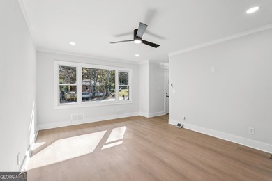 Luxury living on a budget! Picture a home that minds its on Browns Mill Golf Course in Georgia - for sale on GolfHomes.com, golf home, golf lot