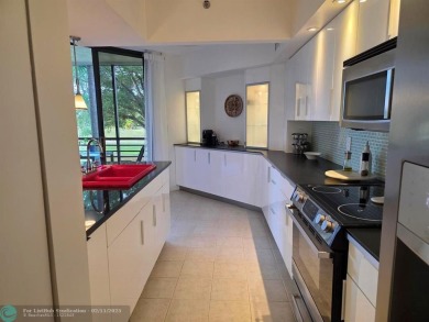 Gorgeous Spacious Remodeled 1bd +Den, 2ba corner unit in Environ on Inverrary Country Club in Florida - for sale on GolfHomes.com, golf home, golf lot