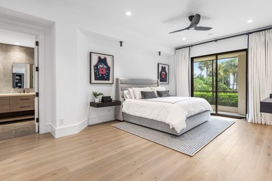 Beyond the private gates of Boca Grove Country Club, a residence on Boca Grove Golf and Tennis in Florida - for sale on GolfHomes.com, golf home, golf lot