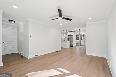 Luxury living on a budget! Picture a home that minds its on Browns Mill Golf Course in Georgia - for sale on GolfHomes.com, golf home, golf lot