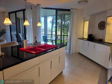 Gorgeous Spacious Remodeled 1bd +Den, 2ba corner unit in Environ on Inverrary Country Club in Florida - for sale on GolfHomes.com, golf home, golf lot