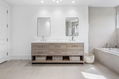 Beyond the private gates of Boca Grove Country Club, a residence on Boca Grove Golf and Tennis in Florida - for sale on GolfHomes.com, golf home, golf lot