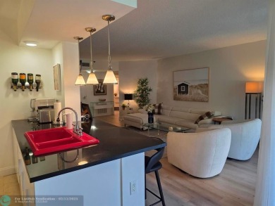 Gorgeous Spacious Remodeled 1bd +Den, 2ba corner unit in Environ on Inverrary Country Club in Florida - for sale on GolfHomes.com, golf home, golf lot