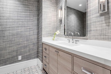 Beyond the private gates of Boca Grove Country Club, a residence on Boca Grove Golf and Tennis in Florida - for sale on GolfHomes.com, golf home, golf lot