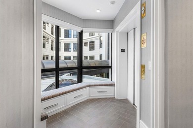 Beyond the private gates of Boca Grove Country Club, a residence on Boca Grove Golf and Tennis in Florida - for sale on GolfHomes.com, golf home, golf lot