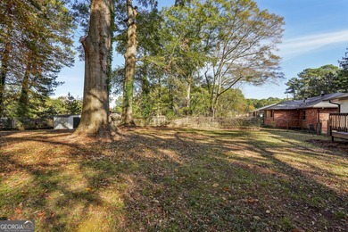 Luxury living on a budget! Picture a home that minds its on Browns Mill Golf Course in Georgia - for sale on GolfHomes.com, golf home, golf lot