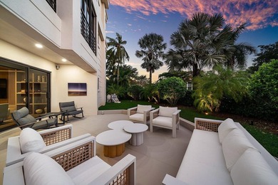 Beyond the private gates of Boca Grove Country Club, a residence on Boca Grove Golf and Tennis in Florida - for sale on GolfHomes.com, golf home, golf lot