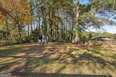 Luxury living on a budget! Picture a home that minds its on Browns Mill Golf Course in Georgia - for sale on GolfHomes.com, golf home, golf lot