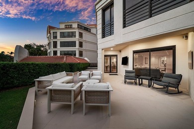 Beyond the private gates of Boca Grove Country Club, a residence on Boca Grove Golf and Tennis in Florida - for sale on GolfHomes.com, golf home, golf lot