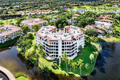 Beyond the private gates of Boca Grove Country Club, a residence on Boca Grove Golf and Tennis in Florida - for sale on GolfHomes.com, golf home, golf lot