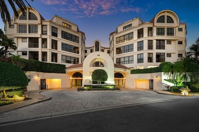 Beyond the private gates of Boca Grove Country Club, a residence on Boca Grove Golf and Tennis in Florida - for sale on GolfHomes.com, golf home, golf lot