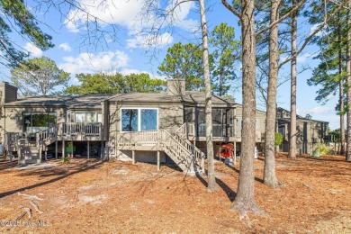 Enjoy stunning water views from nearly every room in this on Harbour Point Golf Club in North Carolina - for sale on GolfHomes.com, golf home, golf lot