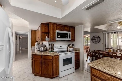 Experience resort style living in the sought after 55+ community on Leisure World Country Club in Arizona - for sale on GolfHomes.com, golf home, golf lot