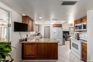 Experience resort style living in the sought after 55+ community on Leisure World Country Club in Arizona - for sale on GolfHomes.com, golf home, golf lot