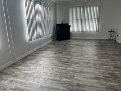 NEW FLOORS, NEW ROOF, INCLUDES PARK CERTIFICATE!!!! Come & Enjoy on Six Lakes Country Club in Florida - for sale on GolfHomes.com, golf home, golf lot