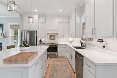 Welcome to this beautiful coastal-style home, tucked away in the on The Golf Club At Sanctuary Cove in Georgia - for sale on GolfHomes.com, golf home, golf lot