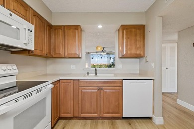 Beautifully updated Clearwater condo in the gated, resort-style on Cove Cay Country Club in Florida - for sale on GolfHomes.com, golf home, golf lot