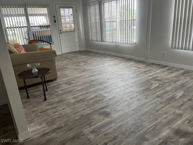 NEW FLOORS, NEW ROOF, INCLUDES PARK CERTIFICATE!!!! Come & Enjoy on Six Lakes Country Club in Florida - for sale on GolfHomes.com, golf home, golf lot