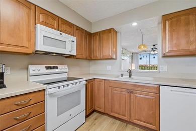 Beautifully updated Clearwater condo in the gated, resort-style on Cove Cay Country Club in Florida - for sale on GolfHomes.com, golf home, golf lot