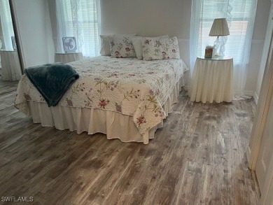 NEW FLOORS, NEW ROOF, INCLUDES PARK CERTIFICATE!!!! Come & Enjoy on Six Lakes Country Club in Florida - for sale on GolfHomes.com, golf home, golf lot