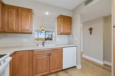 Beautifully updated Clearwater condo in the gated, resort-style on Cove Cay Country Club in Florida - for sale on GolfHomes.com, golf home, golf lot