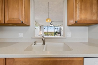 Beautifully updated Clearwater condo in the gated, resort-style on Cove Cay Country Club in Florida - for sale on GolfHomes.com, golf home, golf lot
