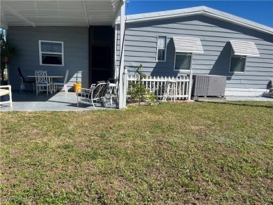 NEW FLOORS, NEW ROOF, INCLUDES PARK CERTIFICATE!!!! Come & Enjoy on Six Lakes Country Club in Florida - for sale on GolfHomes.com, golf home, golf lot