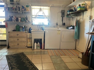 NEW FLOORS, NEW ROOF, INCLUDES PARK CERTIFICATE!!!! Come & Enjoy on Six Lakes Country Club in Florida - for sale on GolfHomes.com, golf home, golf lot