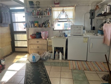 NEW FLOORS, NEW ROOF, INCLUDES PARK CERTIFICATE!!!! Come & Enjoy on Six Lakes Country Club in Florida - for sale on GolfHomes.com, golf home, golf lot