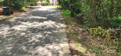 Don't miss this rare opportunity to own two contiguous wooded on Tega Cay Golf Club in South Carolina - for sale on GolfHomes.com, golf home, golf lot
