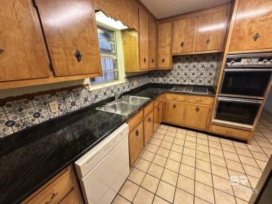 Spacious Gulf Shores Classic with Endless Potential! Discover on The Golf Club of the Wharf in Alabama - for sale on GolfHomes.com, golf home, golf lot