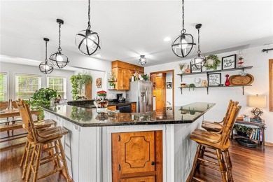 This charming home on the 1st green at Chickasaw Point golf on The Trail At Chickasaw Pointe in South Carolina - for sale on GolfHomes.com, golf home, golf lot