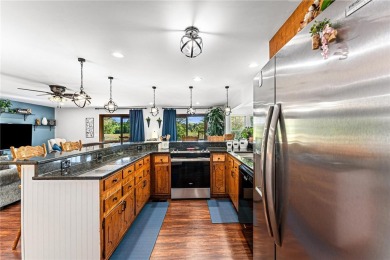 This charming home on the 1st green at Chickasaw Point golf on The Trail At Chickasaw Pointe in South Carolina - for sale on GolfHomes.com, golf home, golf lot