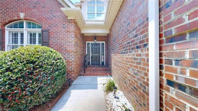 Enter the front door to view the beautiful great room w/stone on Salem Glen Country Club in North Carolina - for sale on GolfHomes.com, golf home, golf lot