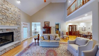 Enter the front door to view the beautiful great room w/stone on Salem Glen Country Club in North Carolina - for sale on GolfHomes.com, golf home, golf lot