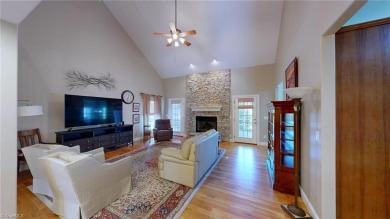 Enter the front door to view the beautiful great room w/stone on Salem Glen Country Club in North Carolina - for sale on GolfHomes.com, golf home, golf lot