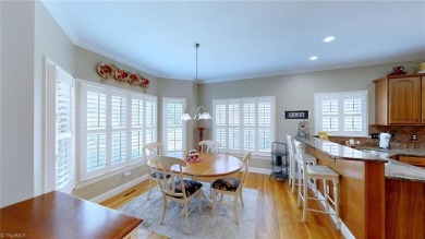 Enter the front door to view the beautiful great room w/stone on Salem Glen Country Club in North Carolina - for sale on GolfHomes.com, golf home, golf lot
