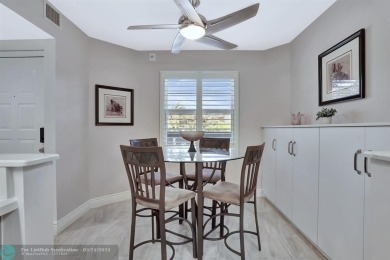 Move right into this tropical paradise of Wynmoor Village! Fully on Wynmoor Golf Course in Florida - for sale on GolfHomes.com, golf home, golf lot